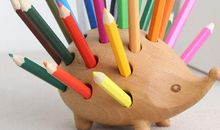 书桌上的笔筒的歇后语