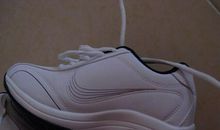 大脚穿小鞋歇后语