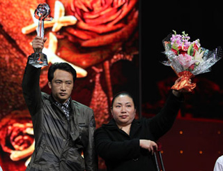 2013年中国人物周岳华，爱琪的事迹