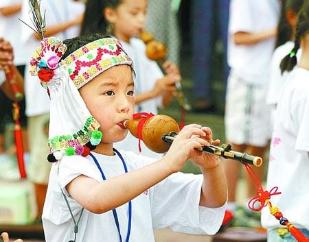 我学会了吹葫芦丝