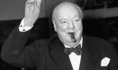What is Winston Churchill's famous personal motto in English that has inspired generations?